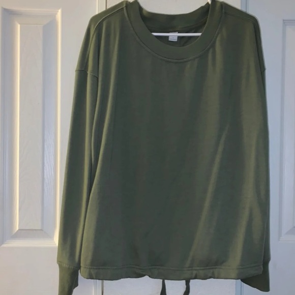 Green women’s back shown green top long sleeve - Picture 1 of 4